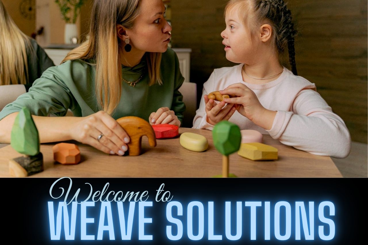 a mother and her disabled daughter playing with wooden blocks, downs syndrome