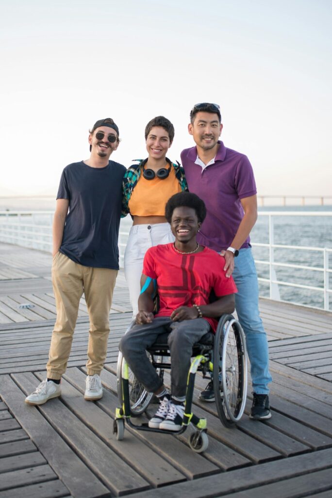 friends hanging out by the pier having fun