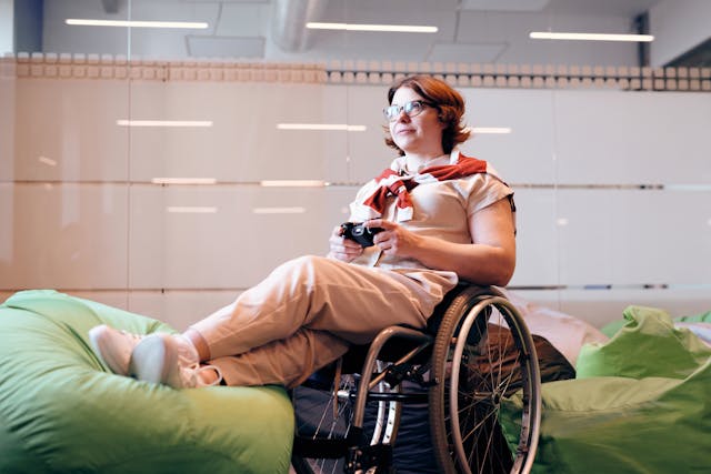 woman in a wheelchair playing game