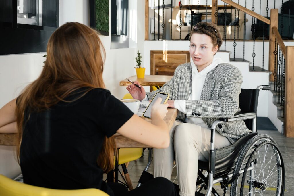 a job interview with a woman in a wheelchair